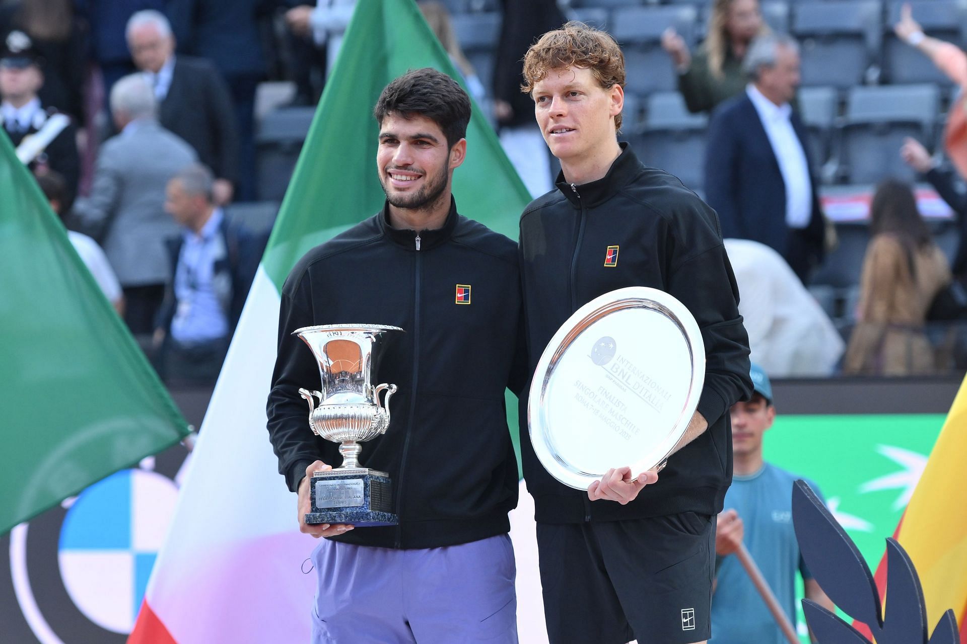 Carlos Alcaraz (left) and Jannik Sinner (right) during the 2025 Italian Open's men's singles trophy presentation ceremony (Source: Getty)